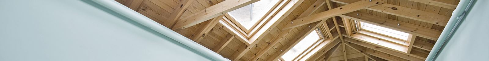 loft conversion wooden roof with velux windows